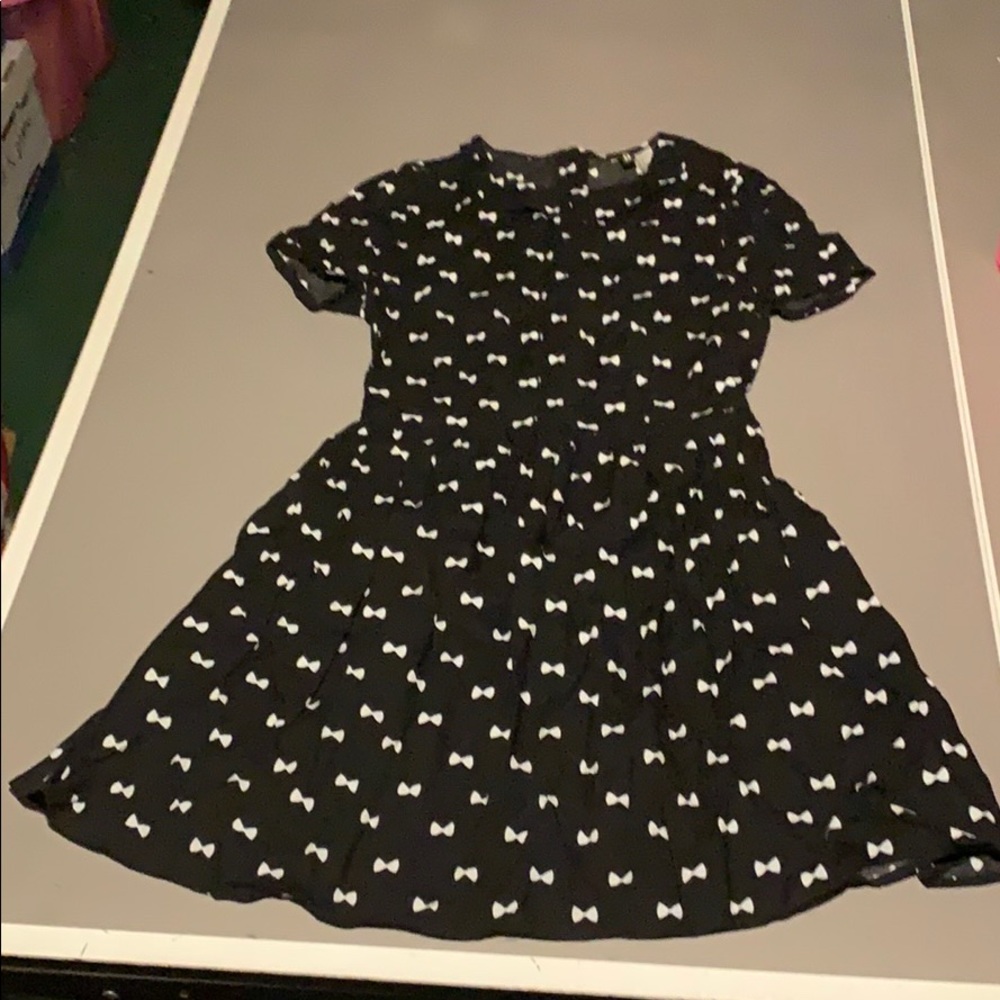 Black dress with white bow pattern